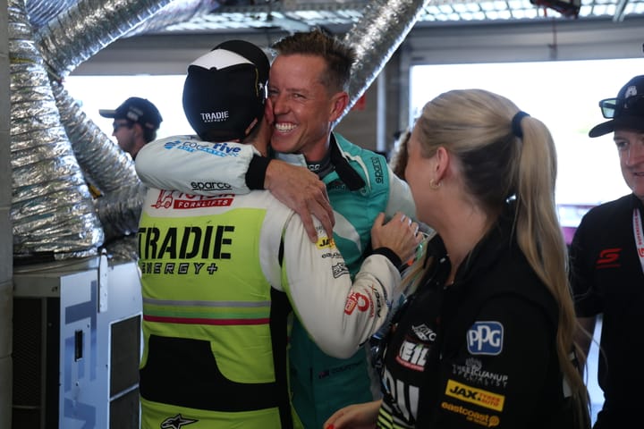 HOT SHOTS: Man hugs.